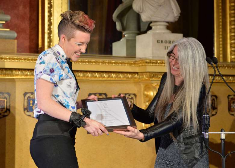Kerry Andrew receives an Award from Dame Evelyn Glennie