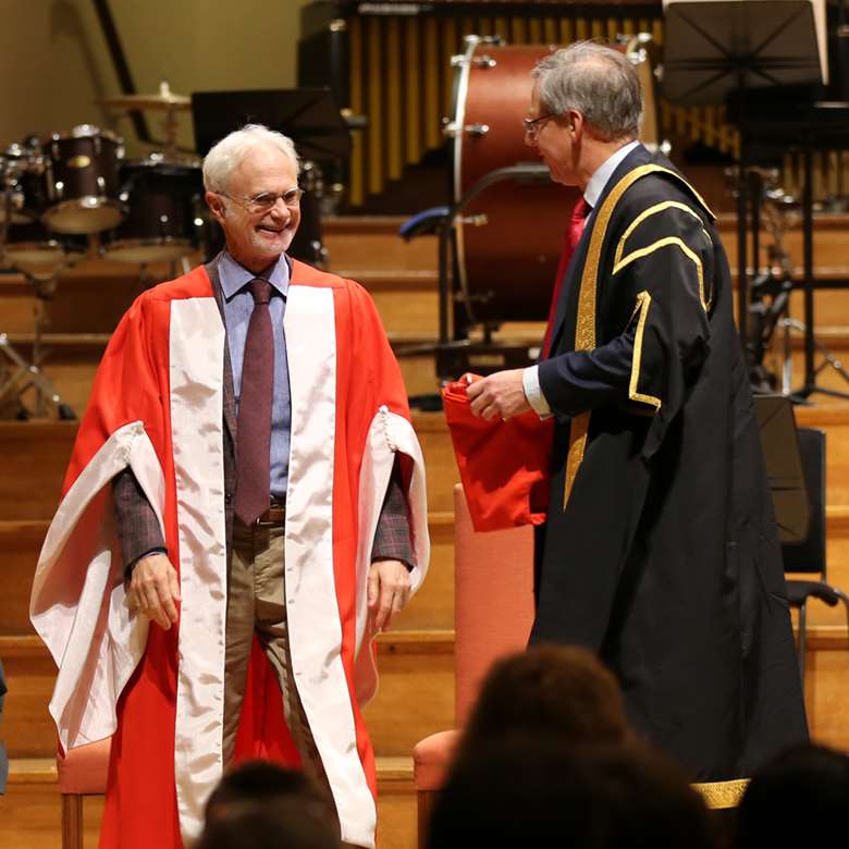 John Adams is awarded his honorary doctorate by RAM Principal, Jonathan Freeman-Attwood
