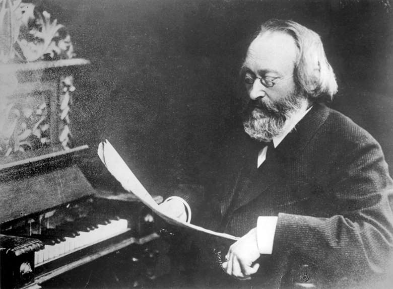 Bruch pictured working at the piano, an instrument he loathed, with its ‘dull rattle-trap’; as he famously remarked, ‘The violin can sing a melody better than the piano can’ (AKG Images)