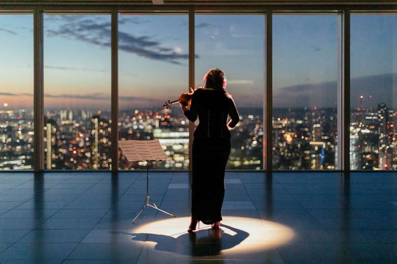 Maxine Kwok performs on the 34th floor of 100 Bishopsgate in PLAY: Rising