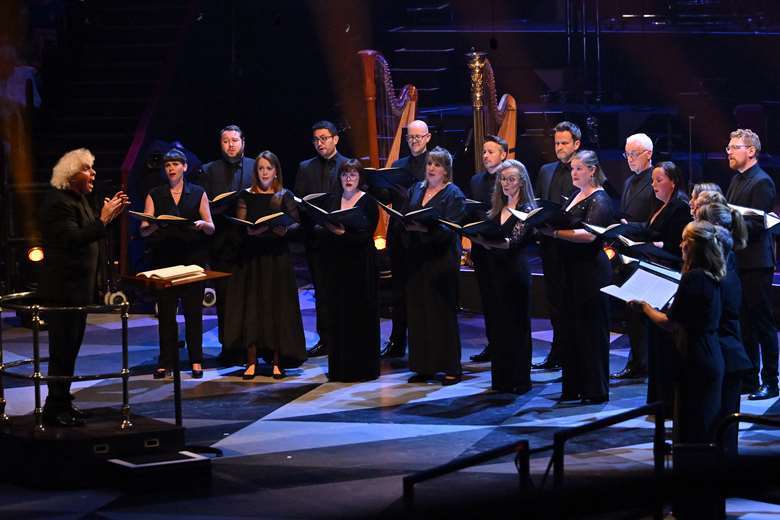 The BBC Singers performing with Sir Simon Rattle